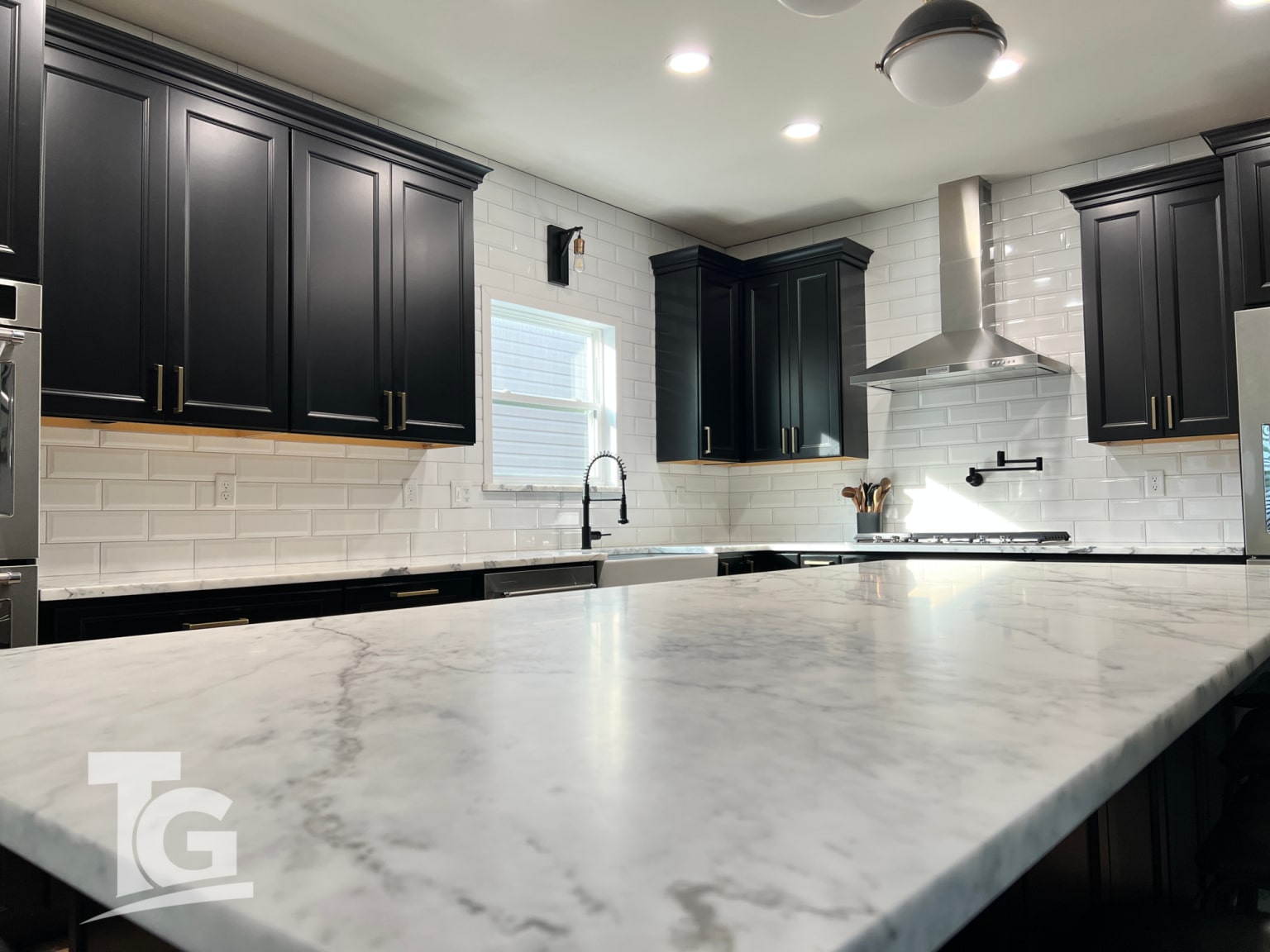 Image showcasing Calacatta Ceraiole Italian Marble Kitchen | Titan Granite - St Louis MO